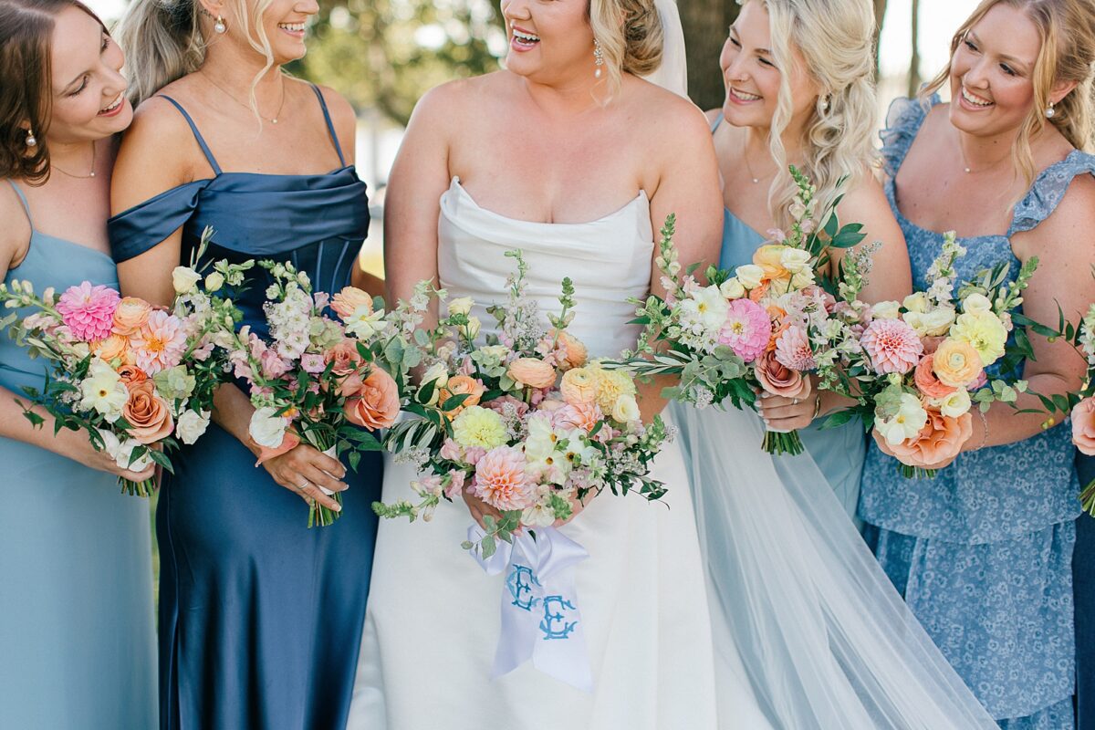 Pastel Wildflower Bouquets. Blue and White Bridesmaids dress. Elevated Coastal Wedding. 