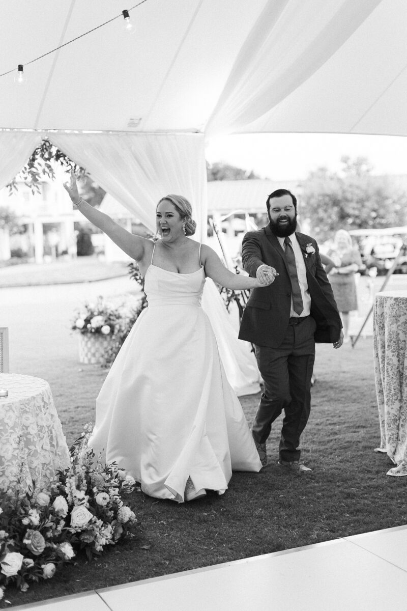 Couple entering a Wedding Reception. Black and White 