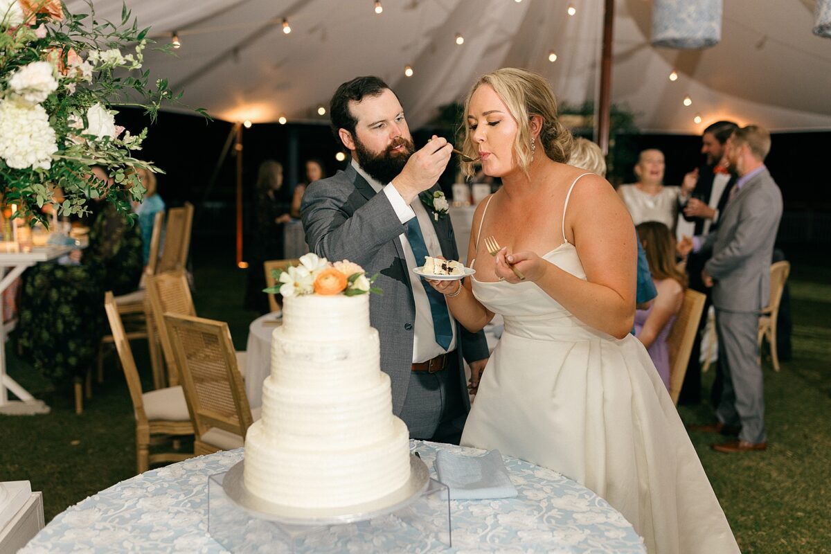 Cake Cutting at a Coastal Outdoor Reception 