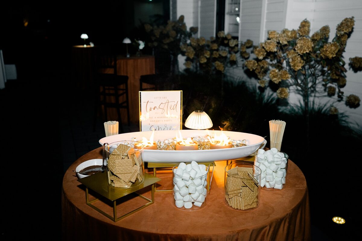 Outside s'mores bar at fall wedding at Kindred Wedding and Event venue. Wedding by Brittanie Raquel Events. 