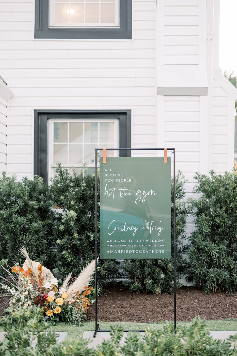 Custom Green Acrylic welcome sign at Kindred Wedding and Event venue. Wedding by Brittanie Raquel Events. 