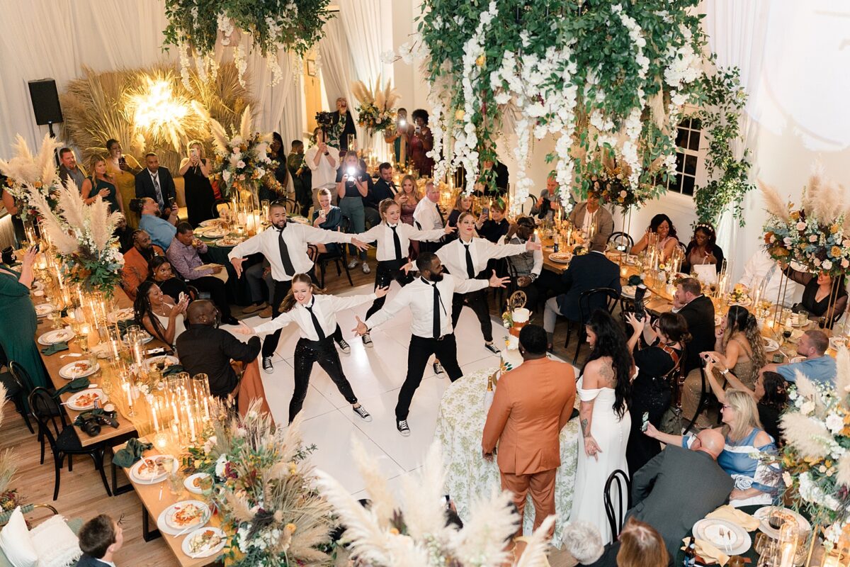 A dance group, flash mob at a Carolina Beach, NC Wedding by Brittanie Raquel Events. 