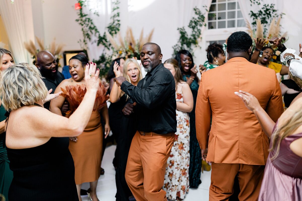 Bold fall wedding reception in Carolina Beach, NC by Brittanie Raquel Events. 