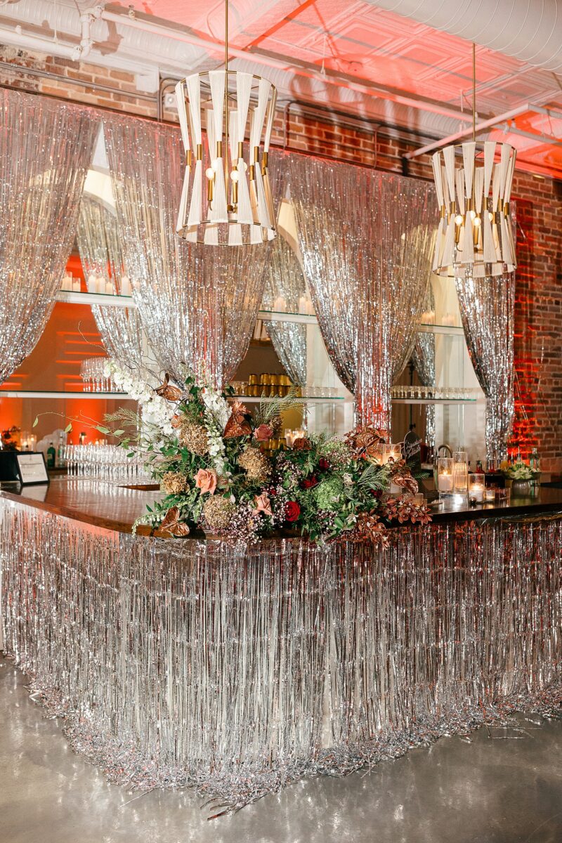 Tinsel covered Cocktail bar at The Elia for a Rodeo Disco themed bar in Downtown Wilmington, NC