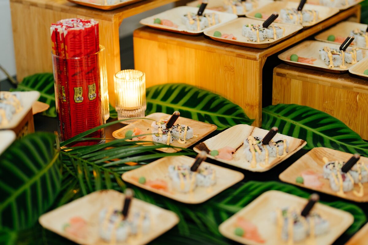 Small plates of sushi on table for guests at wedding reception
