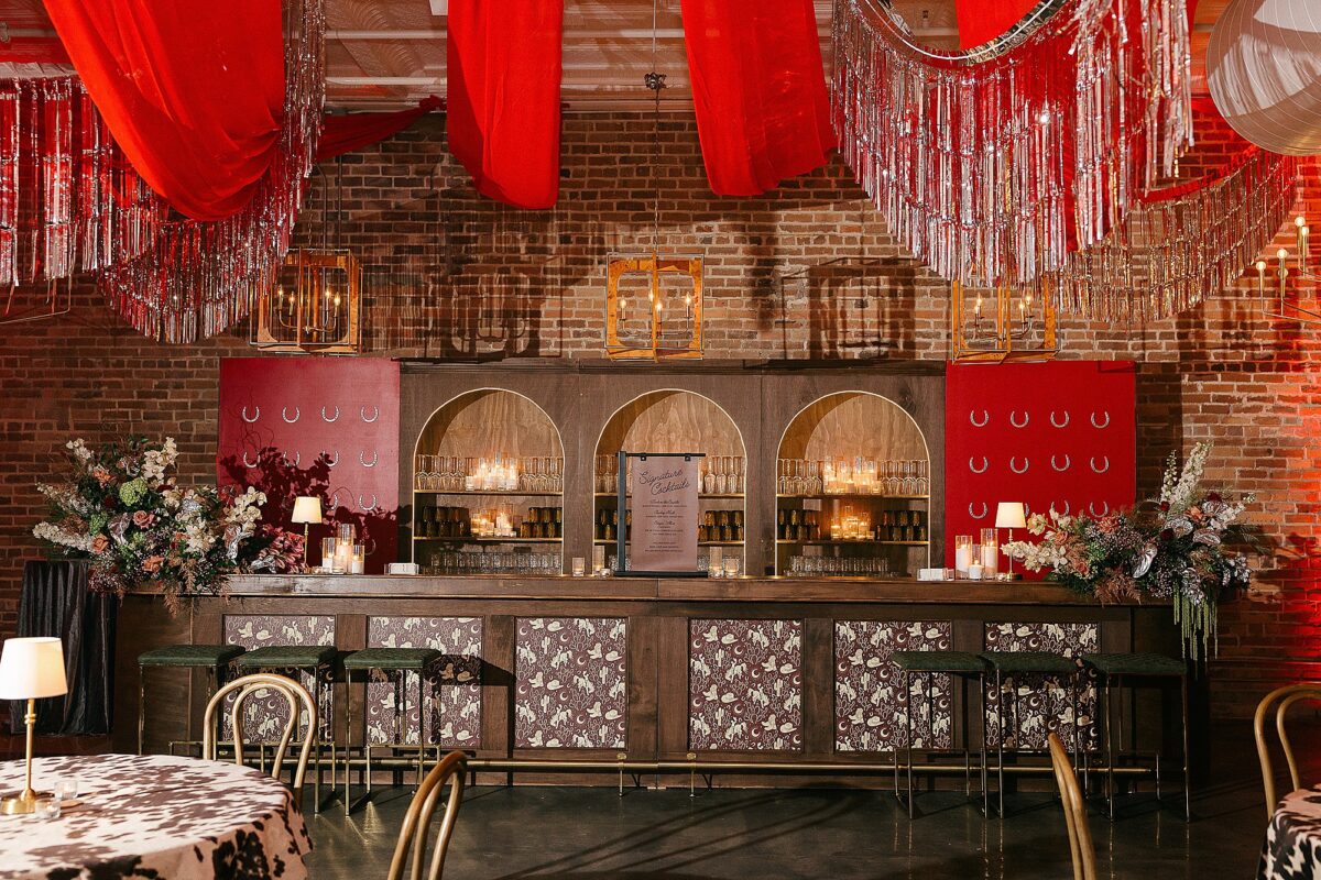 Saloon bar with horseshoe details for western-themed wedding party at The Elia